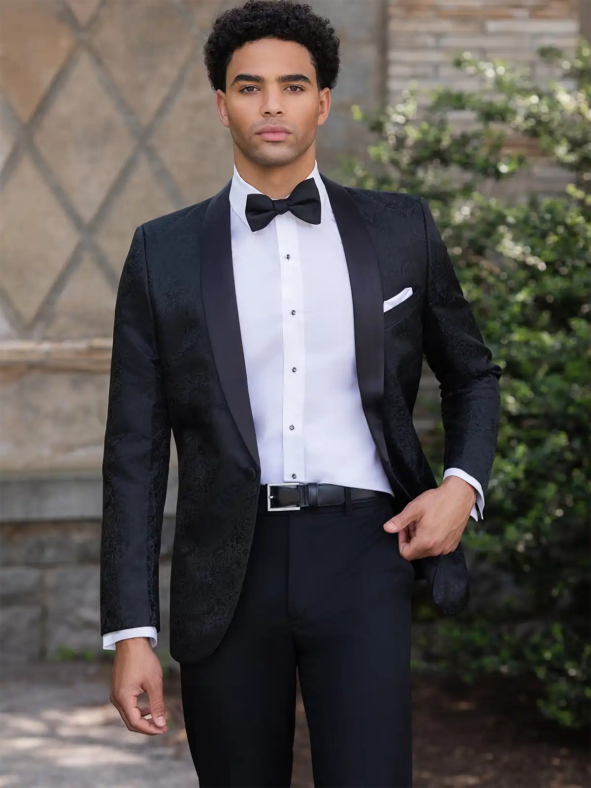 Man in a black tuxedo by Mark of Distinction