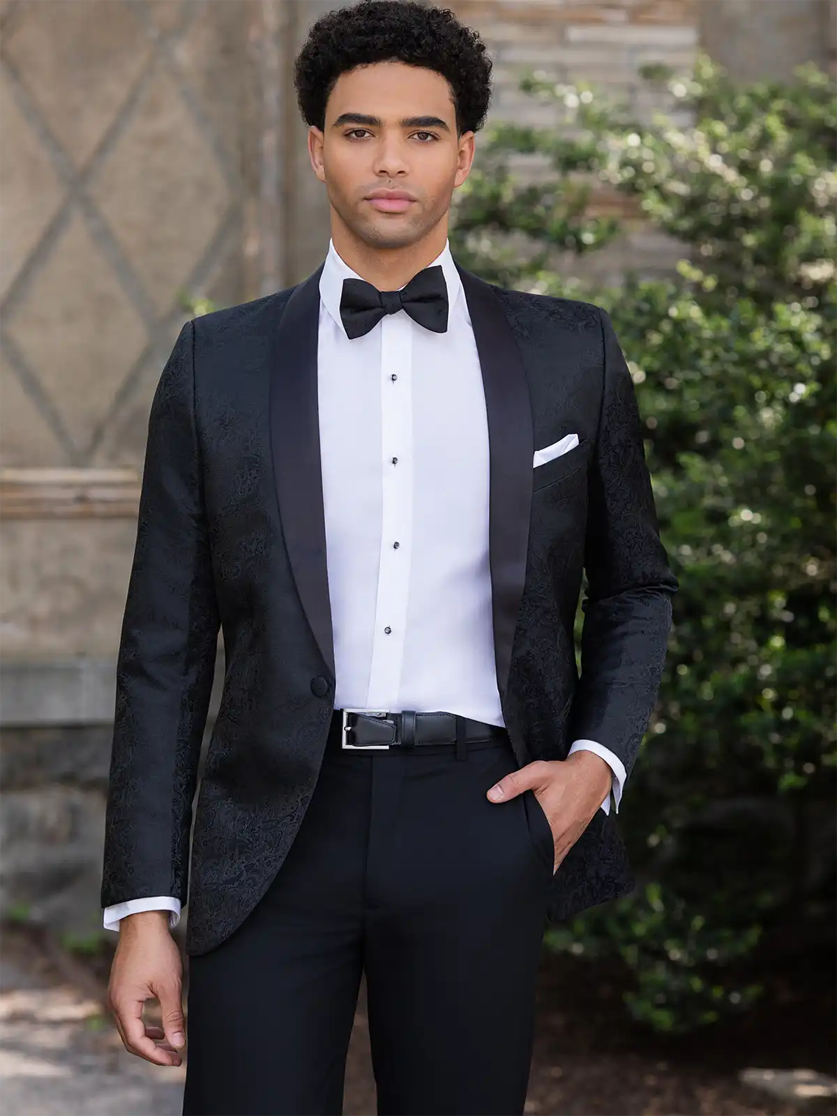 Man in a black tuxedo by Mark of Distinction