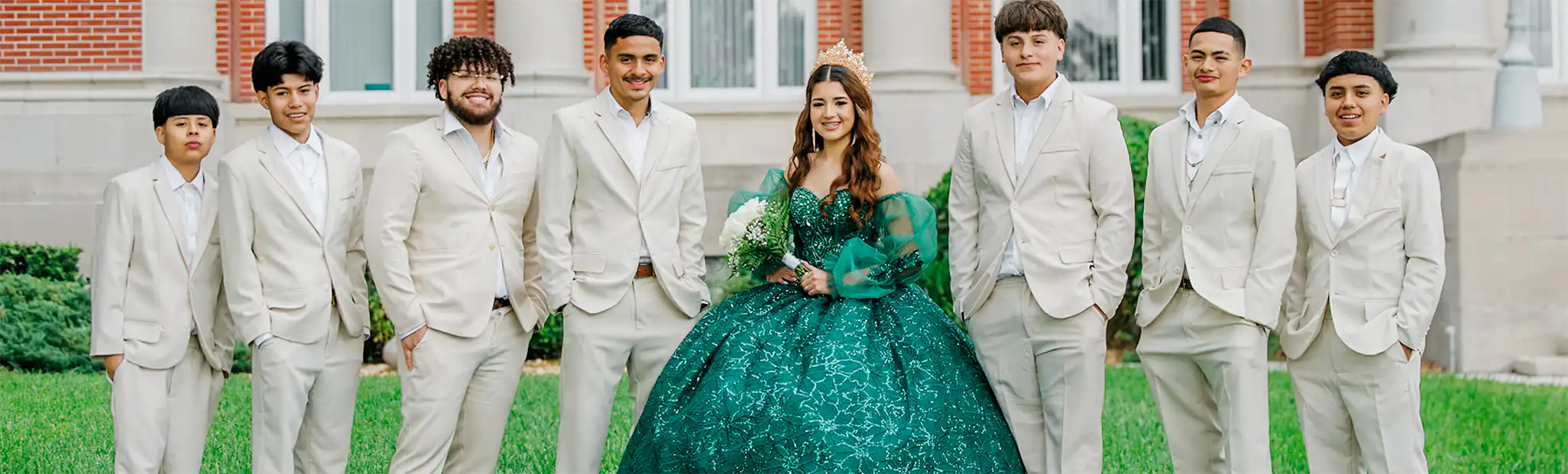 Quinceanera and young men in suits.